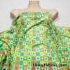 Colorful Squares and Dots on Lime Green Print Poly Spandex Fabric