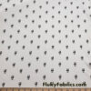 Skulls with Top Hats Print Lightweight Cotton Jersey Spandex Fabric at FlukyFabrics.com