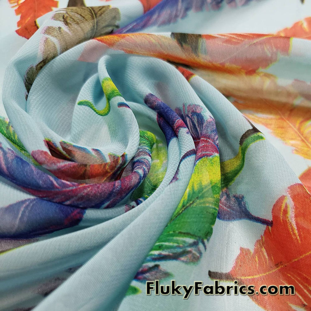 Colorful Feathers Print on Blue Chiffon Fabric