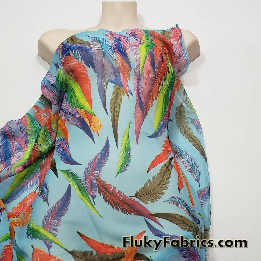 Colorful Feathers Print on Blue Chiffon Fabric