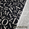 Big Scattered Ivory Letters Print on Black Ponte de Roma Knit Fabric