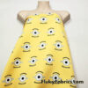 One Eyed Cartoon on Yellow Polyester Woven Knit Boardshort Fabric