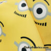 One Eyed Cartoon on Yellow Polyester Woven Knit Boardshort Fabric