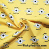 One Eyed Cartoon on Yellow Polyester Woven Knit Boardshort Fabric