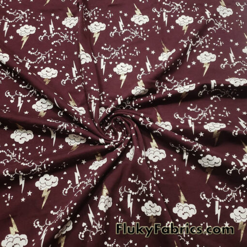 Clouds, Lightning, Hearts and Stars Print on Dark Burgundy Color Fleece Fabric