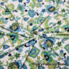 Paisleys and Flowers on White Nylon Spandex Fabric