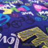 Colorful Love and Peace Signs Print on Royal Blue French Terry 100% Cotton Fabric