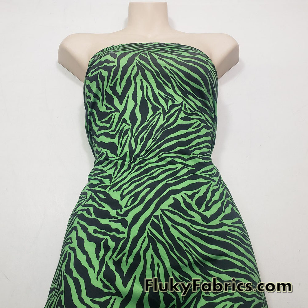 Green and Black Animal Print Poly Spandex Fabric