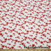 Dark Red Stars on Off White Lightweight Rayon Spandex Jersey Knit Fabric by the Yard at flukyfabrics.com