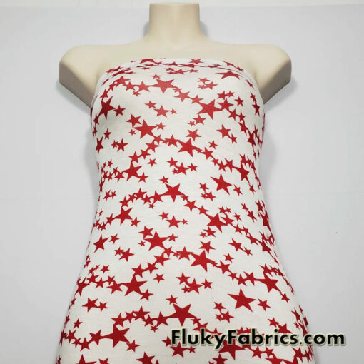Dark Red Stars on Off White Lightweight Rayon Spandex Jersey Knit Fabric