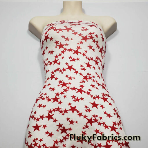 Dark Red Stars on Off White Lightweight Rayon Spandex Jersey Knit Fabric