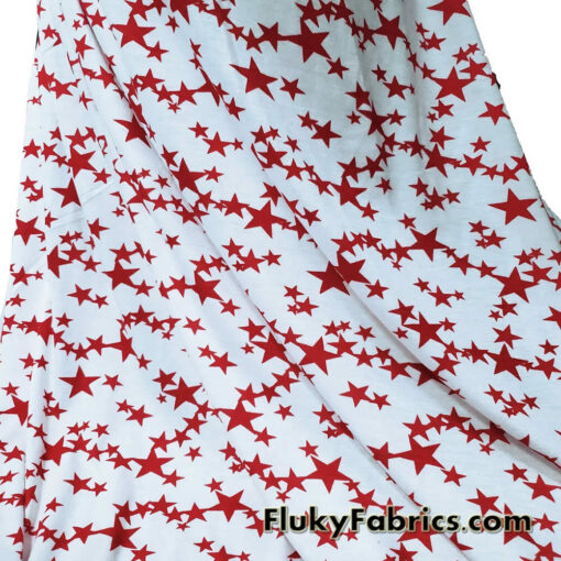 Dark Red Stars on Off White Lightweight Rayon Spandex Jersey Knit Fabric