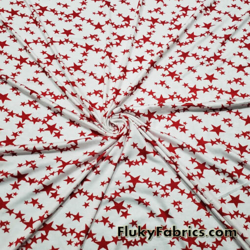 Dark Red Stars on Off White Lightweight Rayon Spandex Jersey Knit Fabric