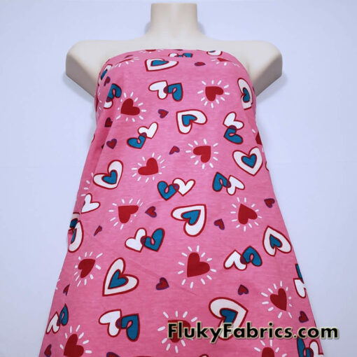 White, Blue and Red Hearts on Pink Cotton Jersey Fabric