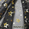 Gold and Silver Foil Stars on 2-Way Stretch Black Mesh Fabric