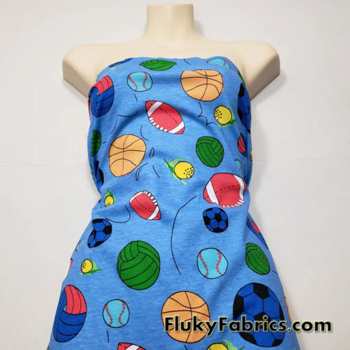 Sport Balls On a Blue Background Cotton Jersey Fabric