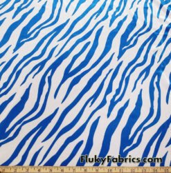Royal Blue Animal Print on White Stretch Velvet Fabric by the Yard at flukyfabrics.com
