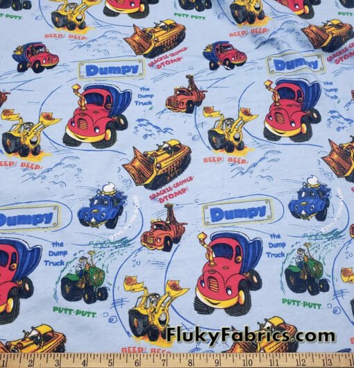 Cartoon Construction Trucks on Blue Cotton Rib Fabric