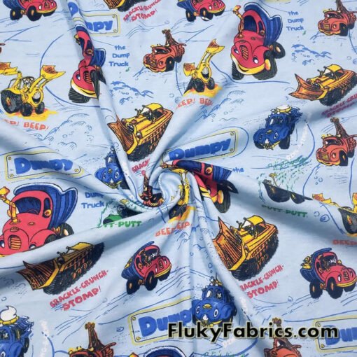 Cartoon Construction Trucks on Blue Cotton Rib Fabric
