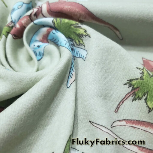 Dino Delight Cotton Rib Fabric – Perfect for Apparel, Pajamas, and More