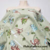 Dino Delight Cotton Rib Fabric – Perfect for Apparel, Pajamas, and More