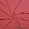 Elegant Salmon Nylon Spandex Fabric - Perfect for Swimwear, Swimsuits, Athletic Wear at flukyfabrics.com
