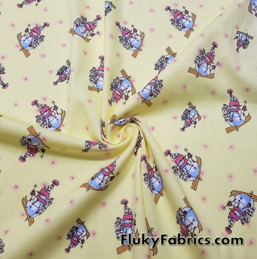 Winter Themed Vintage Cotton Rib Knit Fabric – Skiing Snowmen on Pastel Yellow