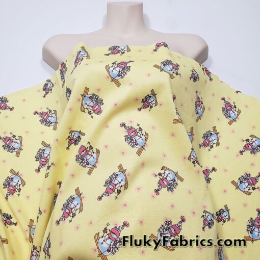 Winter Themed Vintage Cotton Rib Knit Fabric – Skiing Snowmen on Pastel Yellow