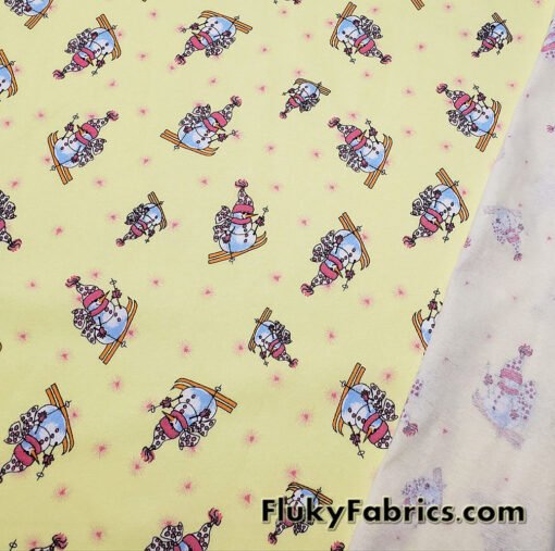 Winter Themed Vintage Cotton Rib Knit Fabric – Skiing Snowmen on Pastel Yellow