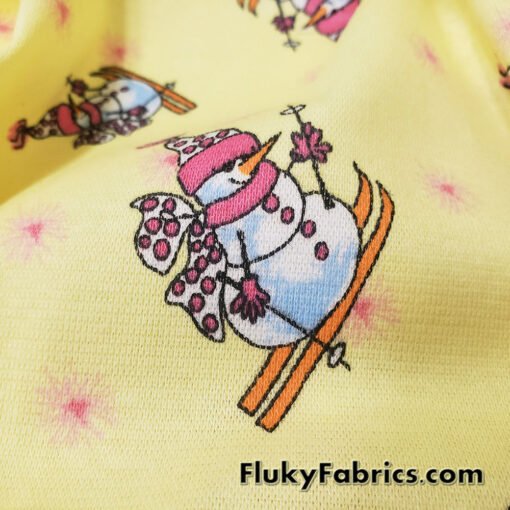 Winter Themed Vintage Cotton Rib Knit Fabric – Skiing Snowmen on Pastel Yellow