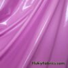 Ultra Pink Color Imitation Latex Fabric - Glossy Liquid Look with 4-Way Stretch at flukyfabrics.com