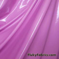 Ultra Pink Color Imitation Latex Fabric - Glossy Liquid Look with 4-Way Stretch at flukyfabrics.com