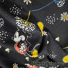 Cartoon Extravaganza on Black – Liverpool Knit Fabric for Adorable Creations