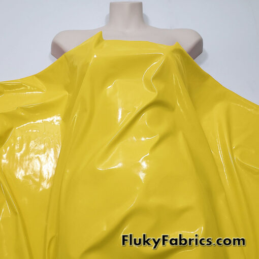 Bright Yellow Imitation Latex Fabric – Glossy Liquid Look with 4-Way Stretch