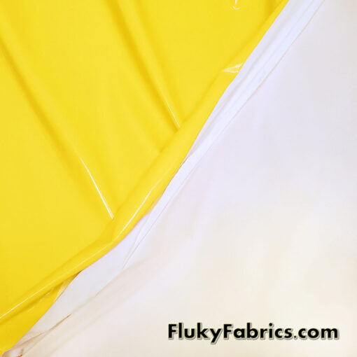 Bright Yellow Imitation Latex Fabric – Glossy Liquid Look with 4-Way Stretch