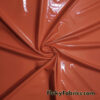 Rich Orange Imitation Latex Fabric – Glossy Liquid Look with 4-Way Stretch