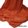 Rich Orange Imitation Latex Fabric – Glossy Liquid Look with 4-Way Stretch