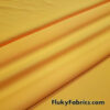 Sunshine Yellow Matte 4-Way Stretch Nylon Spandex Fabric by The Yard